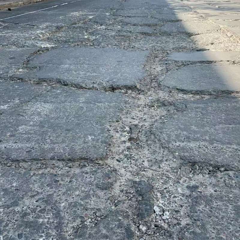 永城路面起砂露石子修补料